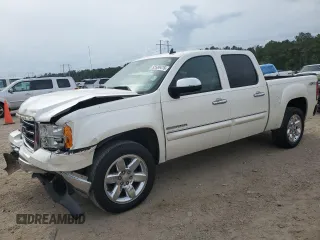 2012 GMC Sierra 1500 SLT with VIN 3GTP2WE77CG247159, listed as a Copart auction lot 55580415 with 156,977 mi miles and Salvage title. Bid and sale history available at DreamBid. Image 1.