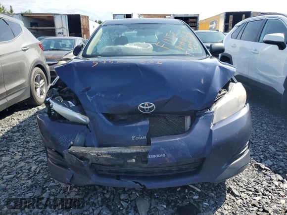 2011 Toyota Matrix with VIN 2T1KU4EE8BC687259, listed as a Copart auction lot 57562185 with 296,192 mi miles and Salvage title. Bid and sale history available at DreamBid. Image 5.