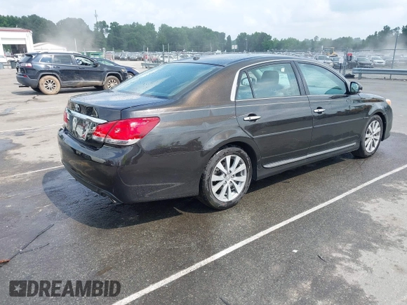 2012 Toyota Avalon with VIN 4T1BK3DB8CU458894, listed as a IAAI auction lot 42414799 with 163,212 mi miles and . Bid and sale history available at DreamBid. Image 4.