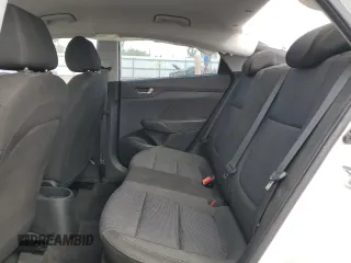 2022 Hyundai Accent SE z VIN 3KPC24A6XNE180152, wystawiony jako Copart lot #50149975 z przebiegiem 25 687 mil mil oraz Szkoda całkowita • Salvage title. Historia ofert i sprzedaży dostępna na DreamBid. Obrazek 11.