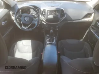 2015 Jeep Cherokee Latitude with VIN 1C4PJMCB6FW734003, listed as a Copart auction lot 54659085 with 146,379 mi miles and Salvage Title. Bid and sale history available at DreamBid. Image 8.