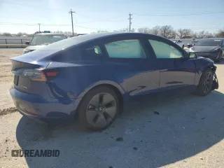 2022 Tesla Model 3 Long Range with VIN 5YJ3E1EB6NF249443, listed as a Copart auction lot 42940215 with Not Provided miles and Salvage Title. Bid and sale history available at DreamBid. Image 3.