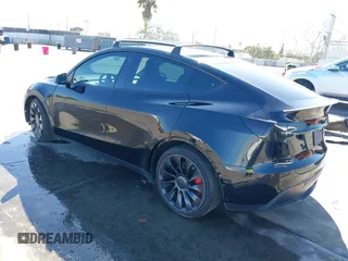 2021 Tesla Model Y Performance with VIN 5YJYGDEF9MF251738, listed as a IAAI auction lot 41708950 with 61,248 mi miles and . Bid and sale history available at DreamBid. Image 3.