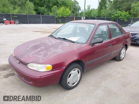 1998 Chevrolet Prizm Lsi z VIN 1Y1SK528XWZ423879, wystawiony jako IAAI lot #42522200 z przebiegiem 171 445 mil mil oraz . Historia ofert i sprzedaży dostępna na DreamBid. Obrazek 2.