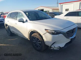2021 Mazda CX-9 Touring with VIN JM3TCBCY1M0507696, listed as a IAAI auction lot 41681192 with 69,330 mi miles. Bid and sale history available at carsss.com. Image 1.