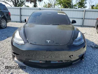 2022 Tesla Model 3 with VIN 5YJ3E1EA1NF374390, listed as a Copart auction lot 52709455 with 44,212 mi miles and Non Repairable. Bid and sale history available at carsss.com. Image 5.