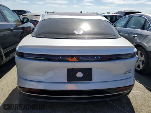 2023 Lucid Air Grand Touring z VIN 50EA1GBA5PA009888, wystawiony jako Copart lot #64742124 z przebiegiem 9311 mil mil oraz Szkody całkowita. Historia ofert i sprzedaży dostępna na DreamBid. Obrazek 6.