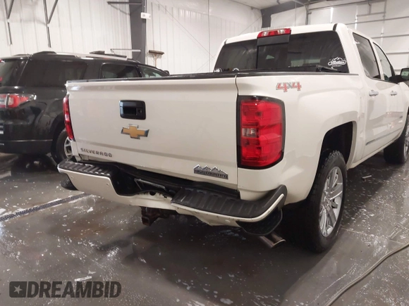 2014 Chevrolet Silverado 1500 High Country with VIN 3GCUKTEC4EG527722, listed as a IAAI auction lot 41978841 with 104,492 mi miles and . Bid and sale history available at DreamBid. Image 6.