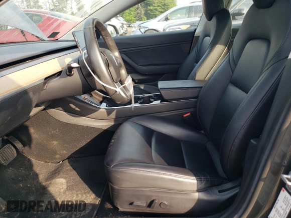 2018 Tesla Model 3 Long Range Battery z VIN 5YJ3E1EB3JF086972, wystawiony jako Copart lot #56290245 z przebiegiem 69 766 mil mil oraz Szkody całkowita. Historia ofert i sprzedaży dostępna na DreamBid. Obrazek 7.