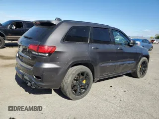 2018 Jeep Grand Cherokee Trackhawk with VIN 1C4RJFN96JC377074, listed as a Copart auction lot 53305975 with 27,625 mi miles and Salvage title. Bid and sale history available at DreamBid. Image 3.