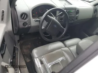 2005 Ford F-150 XL with VIN 1FTRF14W65NB44382, listed as a Copart auction lot 42992825 with 203,839 mi miles and Salvage Title. Bid and sale history available at carsss.com. Image 8.