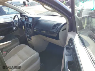 2014 Dodge Grand Caravan SXT with VIN 2C4RDGBG7ER197065, listed as a IAAI auction lot 41674441 with 233,065 mi miles. Bid and sale history available at carsss.com. Image 5.