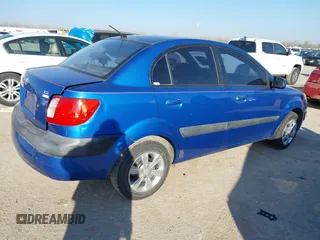 2008 Kia Rio LX with VIN KNADE123X86356526, listed as a IAAI auction lot 41649783 with 201,934 mi miles. Bid and sale history available at carsss.com. Image 4.