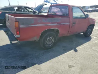1987 Nissan Hardbody E z VIN JN6ND11S3HW006235, wystawiony jako Copart lot #78528914 z przebiegiem 298 079 mil mil oraz Szkody całkowita. Historia ofert i sprzedaży dostępna na DreamBid. Obrazek 3.