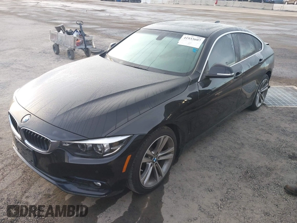 2019 BMW 4 Series 430i with VIN WBA4J1C53KBM17029, listed as a IAAI auction lot 41933607 with 54,107 mi miles and . Bid and sale history available at DreamBid. Image 2.