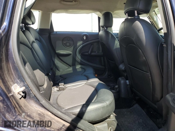 2016 MINI Countryman S with VIN WMWZC5C54GWT38489, listed as a Copart auction lot 63834335 with 102,564 mi miles and Salvage title. Bid and sale history available at DreamBid. Image 10.