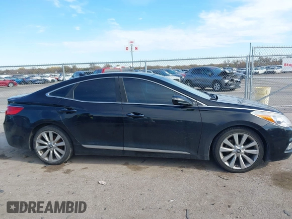 2014 Hyundai Azera Limited with VIN KMHFH4JG7EA353094, listed as a IAAI auction lot 41043222 with 184,924 mi miles and . Bid and sale history available at DreamBid. Image 13.