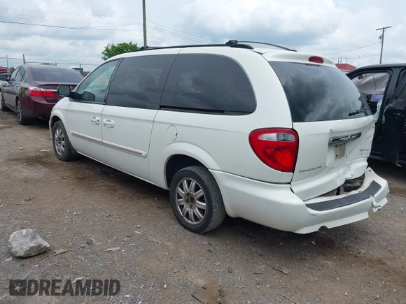 2007 Chrysler Town & Country Touring with VIN 2A4GP54L87R273936, listed as a IAAI auction lot 42181459 with 201,571 mi miles and . Bid and sale history available at DreamBid. Image 3.