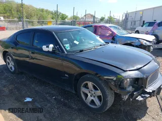 2009 Dodge Charger SXT with VIN 2B3KA33V39H593071, listed as a IAAI auction lot 39318736 with 133,685 mi miles and . Bid and sale history available at carsss.com. Image 1.