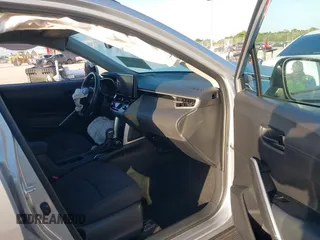 2023 Toyota Corolla Cross LE with VIN 7MUCAAAG0PV037445, listed as a IAAI auction lot 42686510 with 18,282 mi miles and . Bid and sale history available at DreamBid. Image 5.
