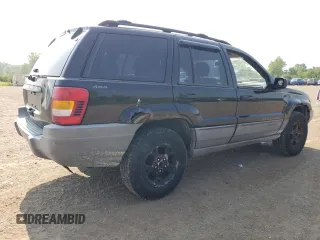 2000 Jeep Grand Cherokee Laredo with VIN 1J4GW48S6YC404063, listed as a Copart auction lot 59442725 with 268,543 mi miles and Salvage title. Bid and sale history available at DreamBid. Image 3.