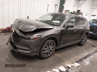 2017 Mazda CX-5 Grand Touring with VIN JM3KFADLXH0151593, listed as a IAAI auction lot 41823378 with 149,299 mi miles. Bid and sale history available at carsss.com. Image 18.