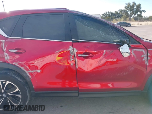 2023 Mazda CX-5 2.5 S Premium Package with VIN JM3KFBDM7P0165741, listed as a IAAI auction lot 41343299 with 35,684 mi miles. Bid and sale history available at carsss.com. Image 14.