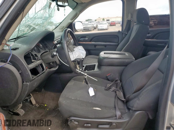 2012 Chevrolet Tahoe LS with VIN 1GNSCAE07CR324228, listed as a Copart auction lot 62649415 with Not provided miles and Salvage title. Bid and sale history available at DreamBid. Image 7.