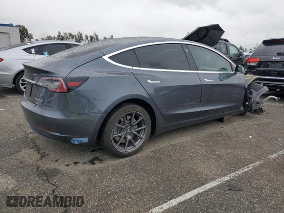 2019 Tesla Model 3 Mid Range with VIN 5YJ3E1EA9KF447453, listed as a Copart auction lot 48967605 with 72,031 mi miles and Salvage Title. Bid and sale history available at DreamBid. Image 3.