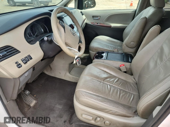 2011 Toyota Sienna XLE AAS с VIN 5TDYK3DC1BS017540, выставлен на аукционе Copart как лот 65177255 с пробегом 164 604 миль миль и Списание • Salvage title. История ставок и продаж доступна на DreamBid. Изображение 7.