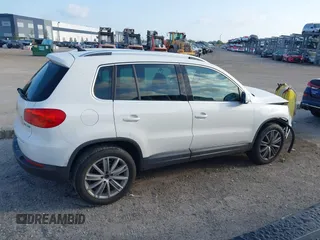 2013 Volkswagen Tiguan SE with VIN WVGAV7AX5DW545202, listed as a IAAI auction lot 42318584 with 91,556 mi miles and . Bid and sale history available at DreamBid. Image 13.