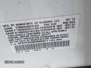 2014 Honda Pilot EX-L with VIN 5FNYF3H50EB005811, listed as a IAAI auction lot 42115804 with 216,033 mi miles and . Bid and sale history available at DreamBid. Image 9.