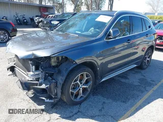 2018 BMW X1 sDrive28i with VIN WBXHU7C36J5L05628, listed as a IAAI auction lot 41708522 with 91,352 mi miles and . Bid and sale history available at DreamBid. Image 18.