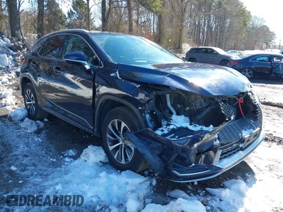 2021 Lexus RX with VIN 2T2HZMDA4MC277227, listed as a IAAI auction lot 41527380 with 52,580 mi miles. Bid and sale history available at carsss.com. Image 6.