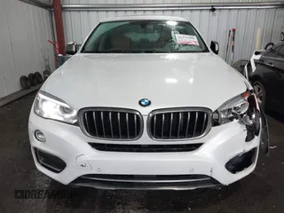 2015 BMW X6 sDrive35i z VIN 5UXKU0C54F0F91660, wystawiony jako IAAI lot #42375390 z przebiegiem 150 209 mil mil oraz . Historia ofert i sprzedaży dostępna na DreamBid. Obrazek 12.
