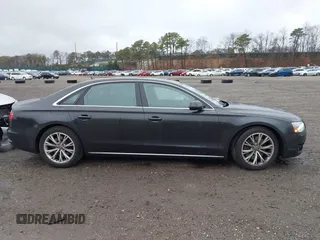 2012 Audi A8 L with VIN WAURVAFD7CN011767, listed as a IAAI auction lot 41848096 with 98,397 mi miles. Bid and sale history available at carsss.com. Image 13.