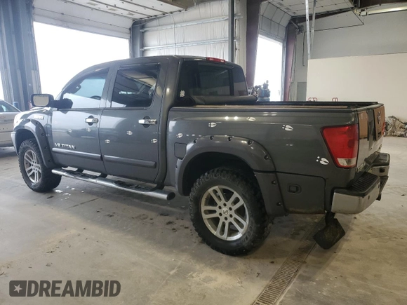 2012 Nissan Titan SL with VIN 1N6BA0ECXCN300562, listed as a Copart auction lot 58244125 with 131,595 mi miles and Salvage title. Bid and sale history available at DreamBid. Image 2.