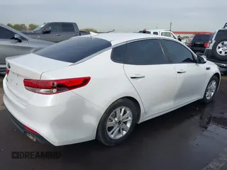 2016 Kia Optima LX with VIN KNAGT4L39G5103589, listed as a IAAI auction lot 41586470 with 104,351 mi miles and . Bid and sale history available at carsss.com. Image 4.