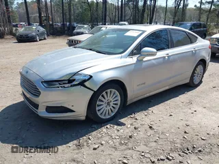 2014 Ford Fusion SE Hybrid with VIN 3FA6P0LU3ER251631, listed as a IAAI auction lot 41917855 with 88,076 mi miles. Bid and sale history available at carsss.com. Image 2.