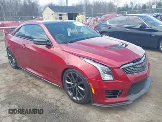 2016 Cadillac ATS-V z VIN 1G6AN1RY0G0100164, wystawiony jako IAAI lot #42016283 z przebiegiem 71 212 mil mil oraz . Historia ofert i sprzedaży dostępna na DreamBid. Obrazek 1.