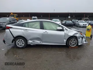 2022 Toyota Prius L Eco with VIN JTDKAMFU1N3177055, listed as a IAAI auction lot 41506862 with 121,318 mi miles and . Bid and sale history available at DreamBid. Image 14.
