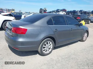 2013 Volkswagen Jetta Sedan SE w/Convenience/Sunroof with VIN 3VWBP7AJ3DM258887, listed as a IAAI auction lot 41611167 with 134,406 mi miles. Bid and sale history available at carsss.com. Image 4.