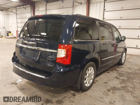 2013 Chrysler Town & Country Touring with VIN 2C4RC1BG7DR517970, listed as a IAAI auction lot 42028284 with 122,053 mi miles. Bid and sale history available at carsss.com. Image 4.