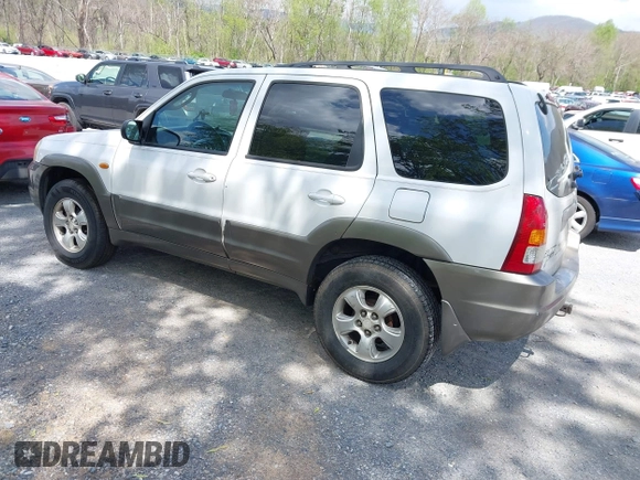 2001 Mazda Tribute LX with VIN 4F2YU09131KM12857, listed as a IAAI auction lot 42034605 with 257,015 mi miles and . Bid and sale history available at carsss.com. Image 3.