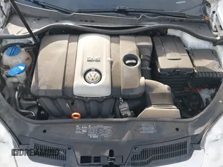 2009 Volkswagen Rabbit S with VIN WVWBB71K09W101853, listed as a IAAI auction lot 41658313 with 83,221 mi miles. Bid and sale history available at carsss.com. Image 10.