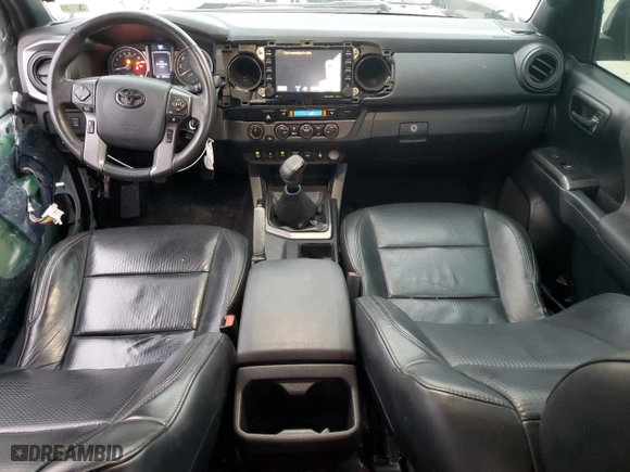 2020 Toyota Tacoma 4WD SR5 with VIN 5TFCZ5AN1LX218079, listed as a Copart auction lot 80085974 with 65,634 mi miles and Salvage Title. Bid and sale history available at carsss.com. Image 8.