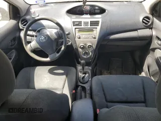 2012 Toyota Yaris with VIN JTDBT4K34C1414203, listed as a Copart auction lot 49721315 with 231,469 mi miles and Salvage Title. Bid and sale history available at carsss.com. Image 8.