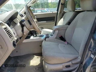 2010 Mercury Mariner with VIN 4M2CN8B7XAKJ03580, listed as a Copart auction lot 57269525 with 265,789 mi miles and Salvage title. Bid and sale history available at DreamBid. Image 7.