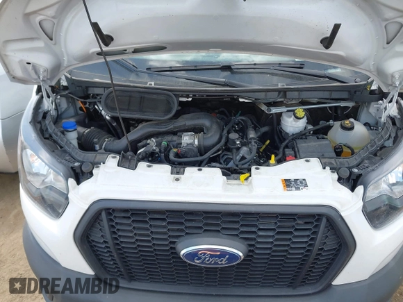 2024 Ford Transit Cargo with VIN 1FTBR1Y89RKA01132, listed as a IAAI auction lot 42668811 with 31,666 mi miles and . Bid and sale history available at DreamBid. Image 10.