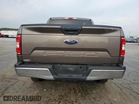 2020 Ford F-150 XL with VIN 1FTEW1C51LFA98104, listed as a Copart auction lot 68889294 with 82,183 mi miles and Salvage Title. Bid and sale history available at carsss.com. Image 6.